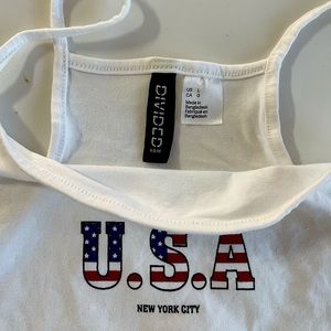 USA 🇺🇸 White crop tank with spaghetti strap.